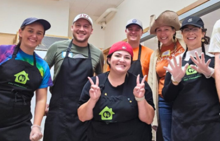 emerging leaders volunteer give back at community cafe serving meals food bank october 2024 meagan jesse ramos paige meyer ryan wilinski kate baer nicole brown